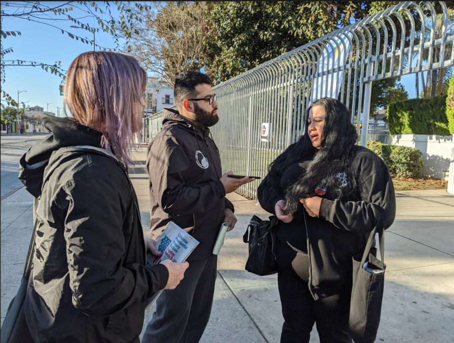 University Times staff interviewing a voter.