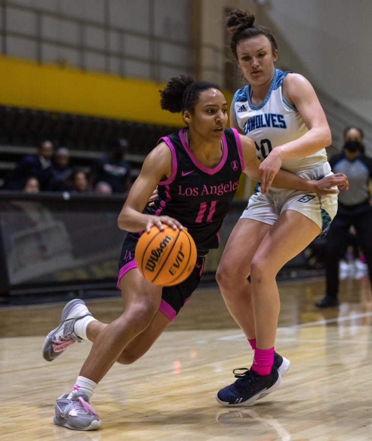 CSULA guard Lily Buggs dribbles past Sonoma State guard Taylor Johnson during the Golden Eagles 61-58 win at University Gym on Thursday, Feb. 23, 2023. Photo by Xavier Zamora.